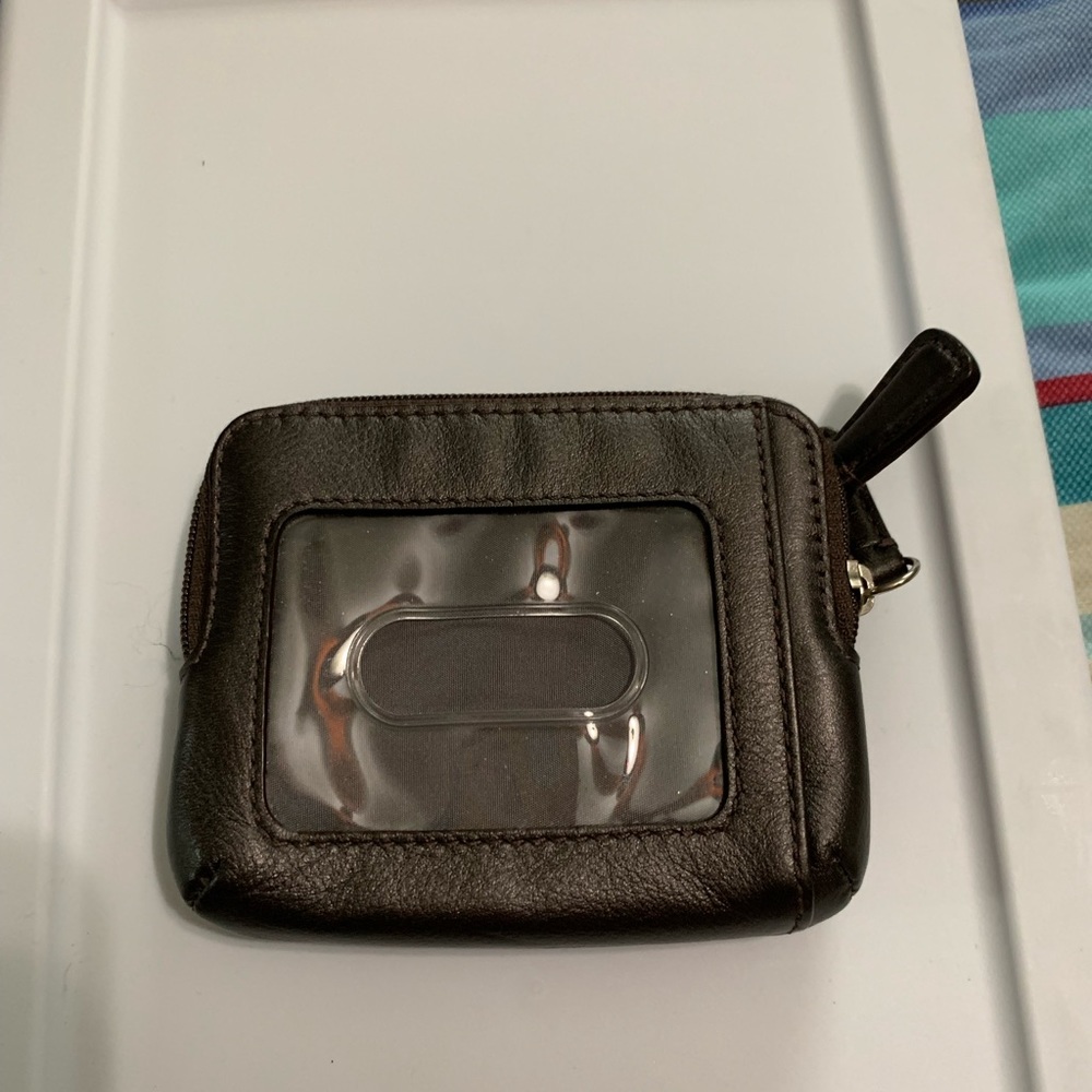 Coach leather change purse in black.